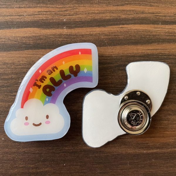 I'm an Ally rainbow and cloud Pride badge with a magnetic clasp